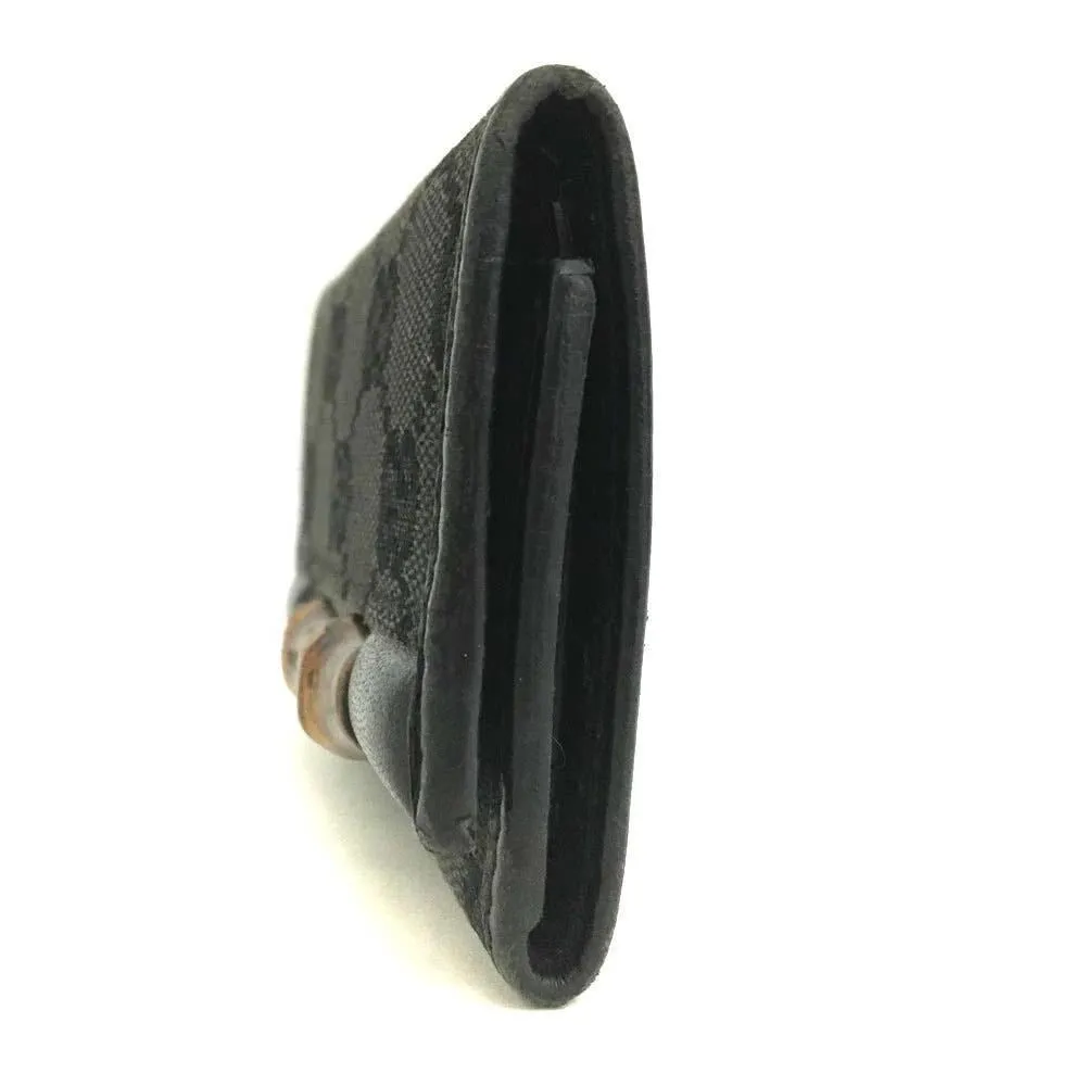 Gucci, black Guccissima print/leather, tri-fold, key holder/card holder, mini- wallet w bamboo accent & slots for your cards