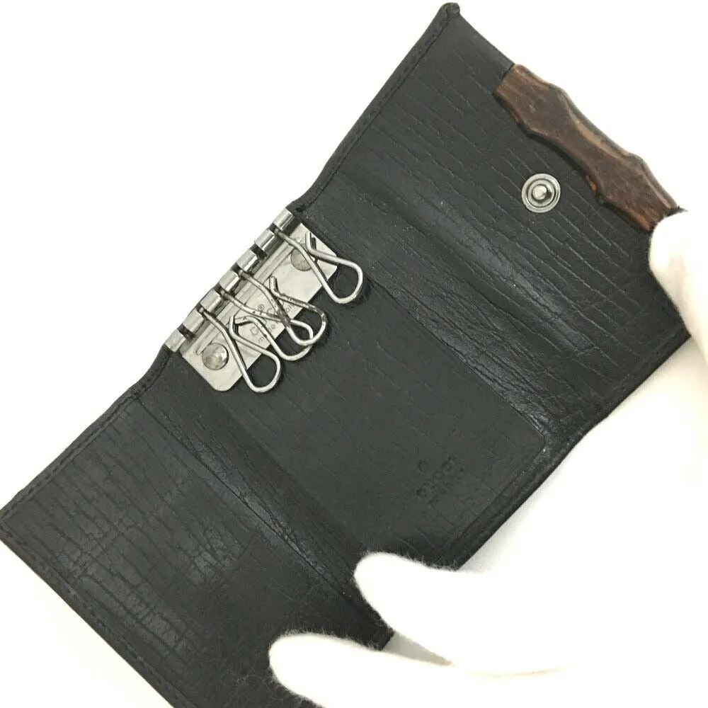 Gucci, black Guccissima print/leather, tri-fold, key holder/card holder, mini- wallet w bamboo accent & slots for your cards