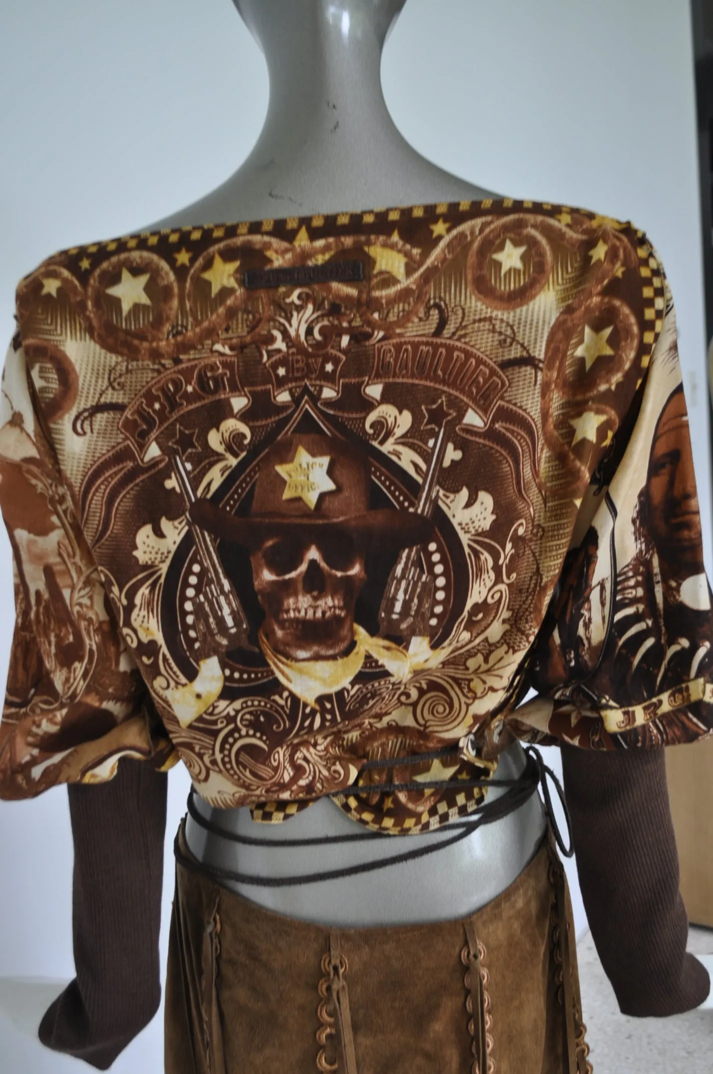 Jean Paul Gaultier top with Sheriff and indian  print Gaultier jeans collection