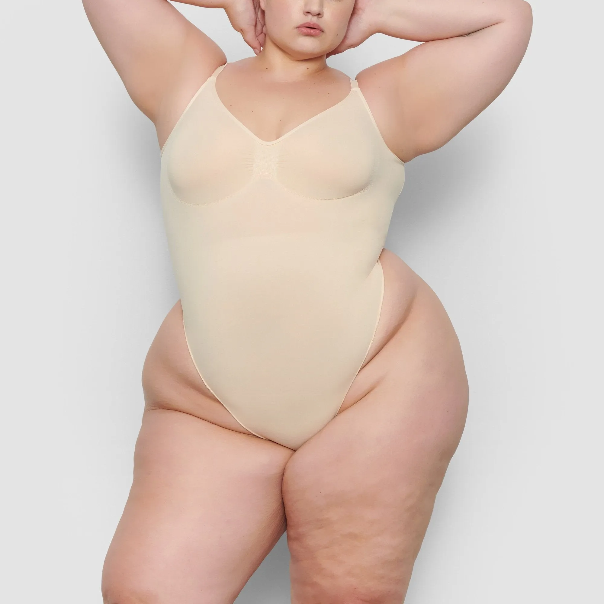 SEAMLESS SCULPT LOW BACK THONG BODYSUIT | SAND