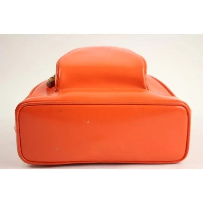 Tom Ford era, Gucci, petite, bright orange patent leather and smooth leather, triangular, messenger bag or backpack with a dual zip closure